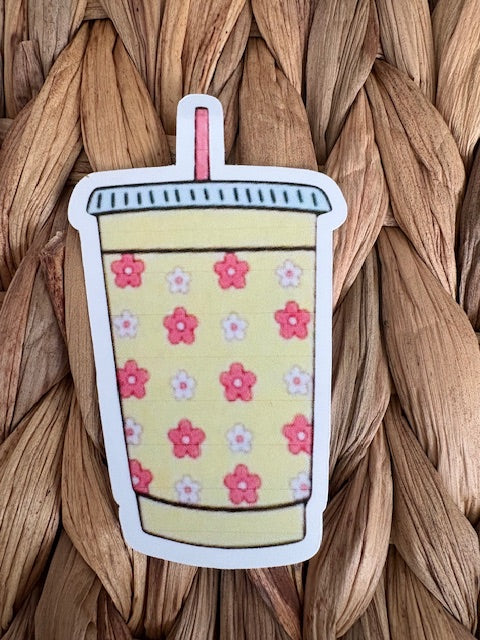 Iced coffee with pink straw
